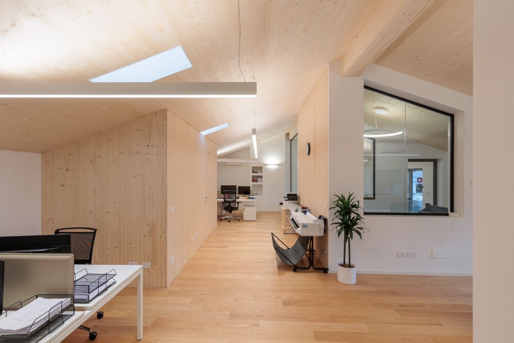 Custom office construction: detail of wooden partition wall