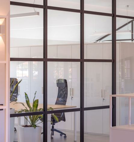 Custom office design: meeting room detail and glass partition wall