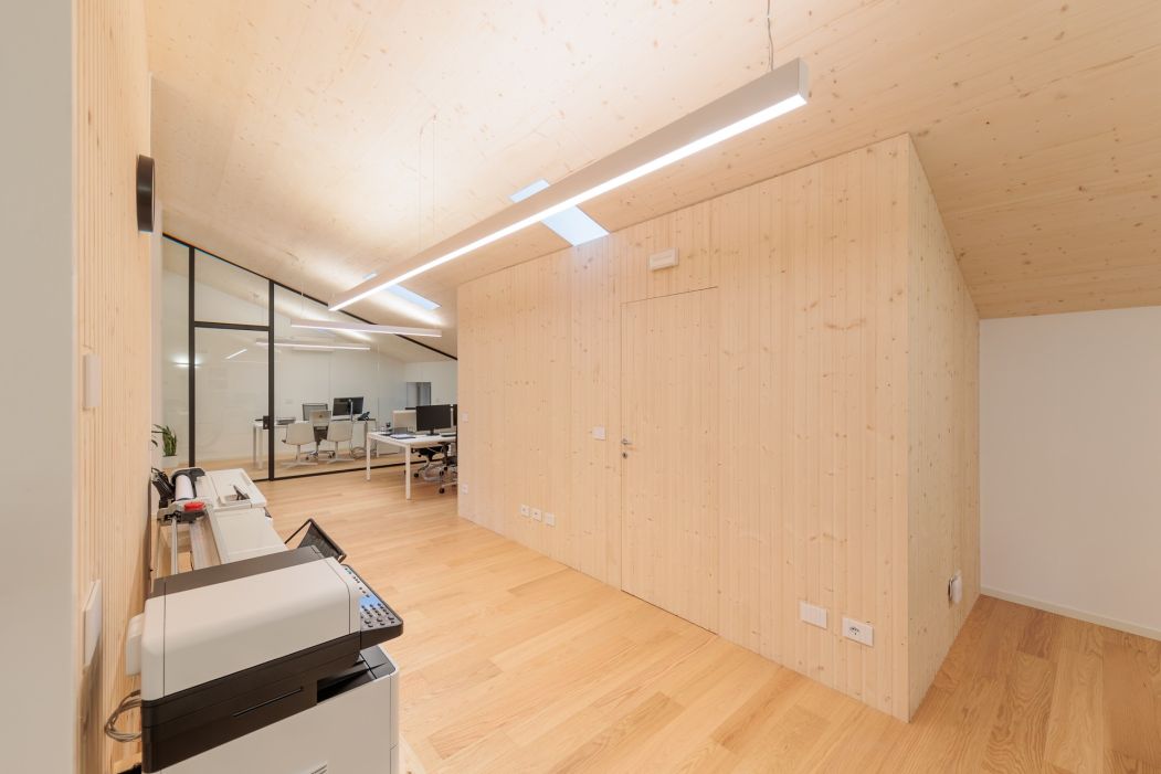 Custom office construction: detail of wooden partition wall